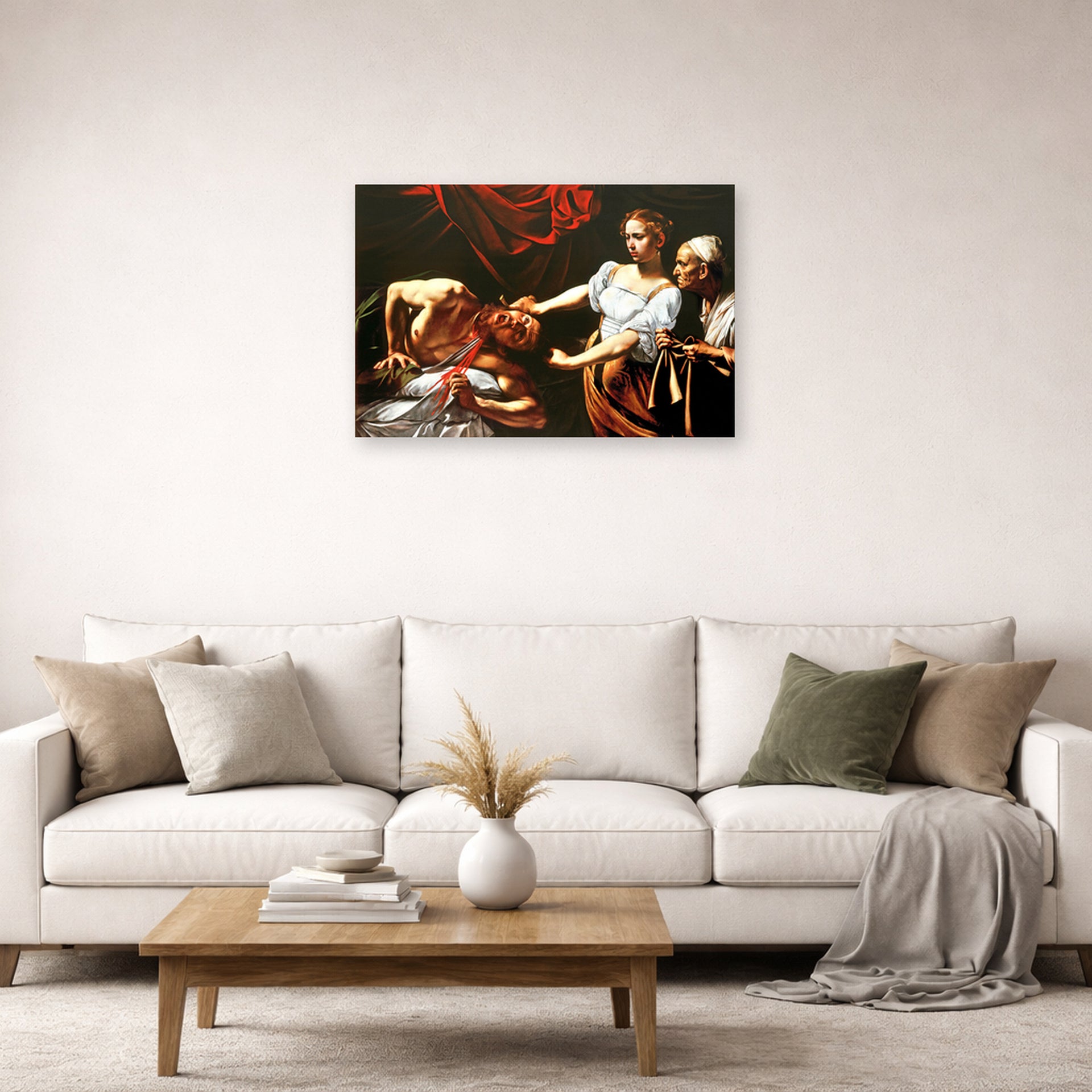 Unframed poster print of Caravaggio's 'Judith Beheading Holofernes' displayed on a wall in a living room