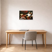 Unframed poster print of Caravaggio's 'Judith Beheading Holofernes' displayed on a wall in an office