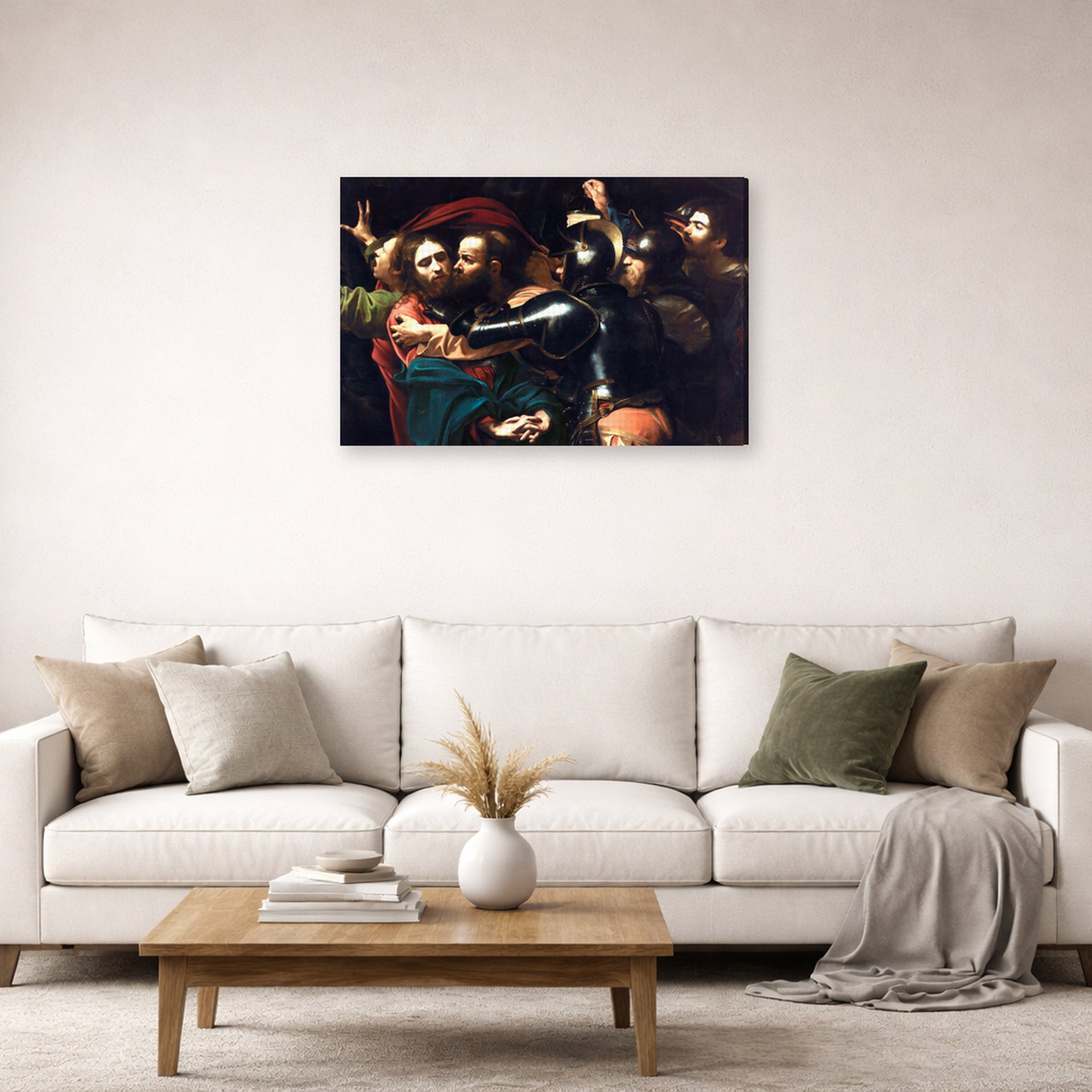 Gallery-wrapped canvas print of Caravaggio's 'Kiss of Judas' displayed on a wall in a living room