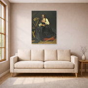 Unframed poster print of Caravaggio's 'St. Catherine of Alexandria' displayed on a wall in a living room