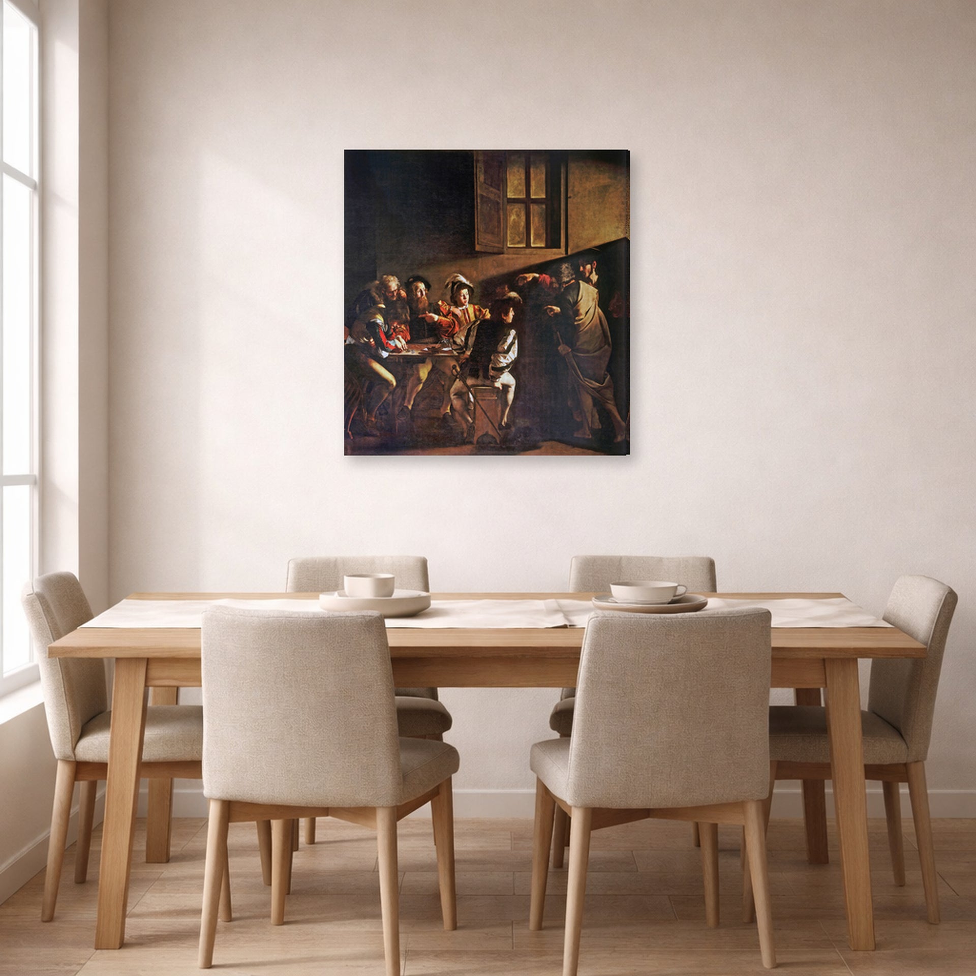 Gallery-wrapped canvas print of Caravaggio's 'The Calling of Saint Matthew' displayed on a wall in a dining room