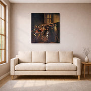 Gallery-wrapped canvas print of Caravaggio's 'The Calling of Saint Matthew' displayed on a wall in a living room