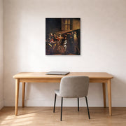 Gallery-wrapped canvas print of Caravaggio's 'The Calling of Saint Matthew' displayed on a wall in an office