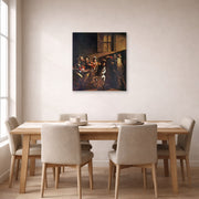 Unframed poster print of Caravaggio's 'The Calling of Saint Matthew' displayed on a wall in a dining room