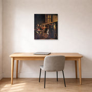 Unframed poster print of Caravaggio's 'The Calling of Saint Matthew' displayed on a wall in an office