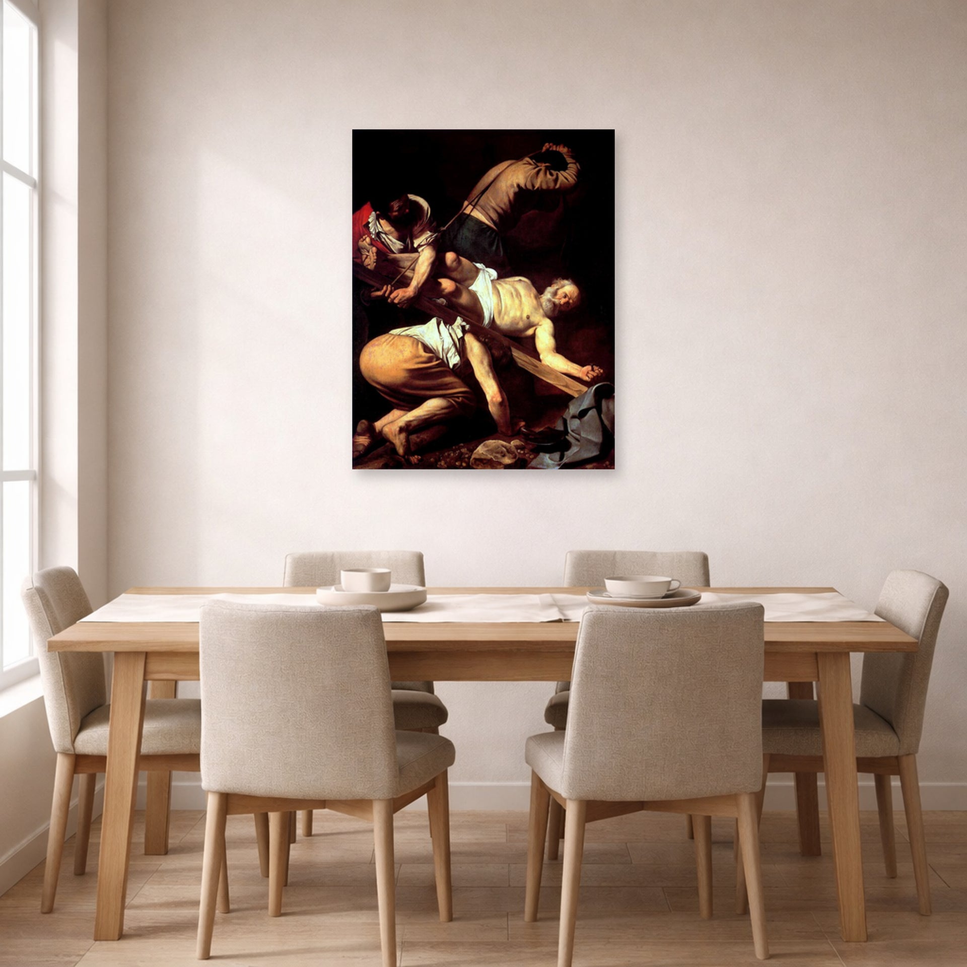 Unframed poster print of Caravaggio's 'The Crucifixion of Saint Peter' displayed on a wall in a dining room