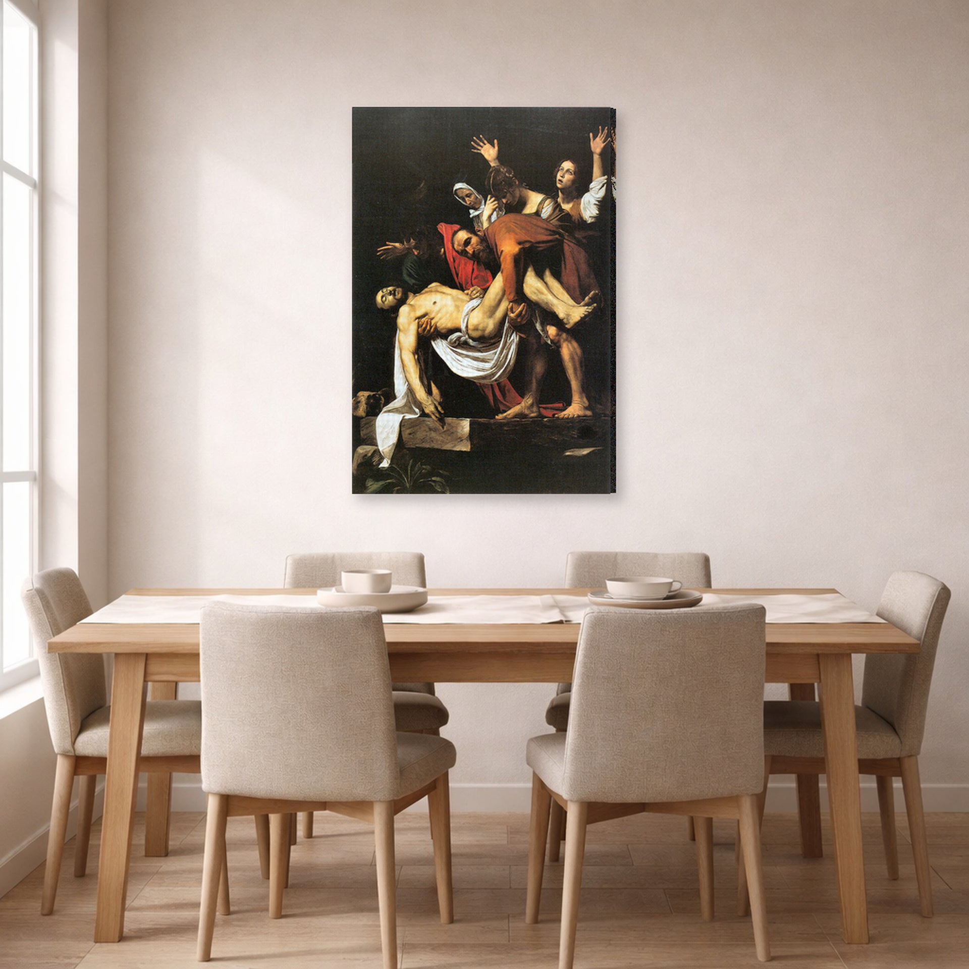 Gallery-wrapped canvas print of Caravaggio's 'The Entombment of Christ' displayed on a wall in a dining room