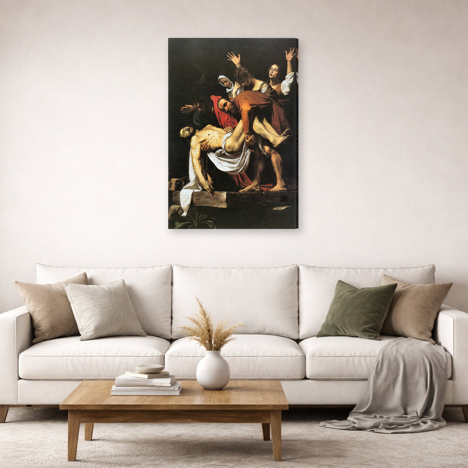 Gallery-wrapped canvas print of Caravaggio's 'The Entombment of Christ' displayed on a wall in a living room
