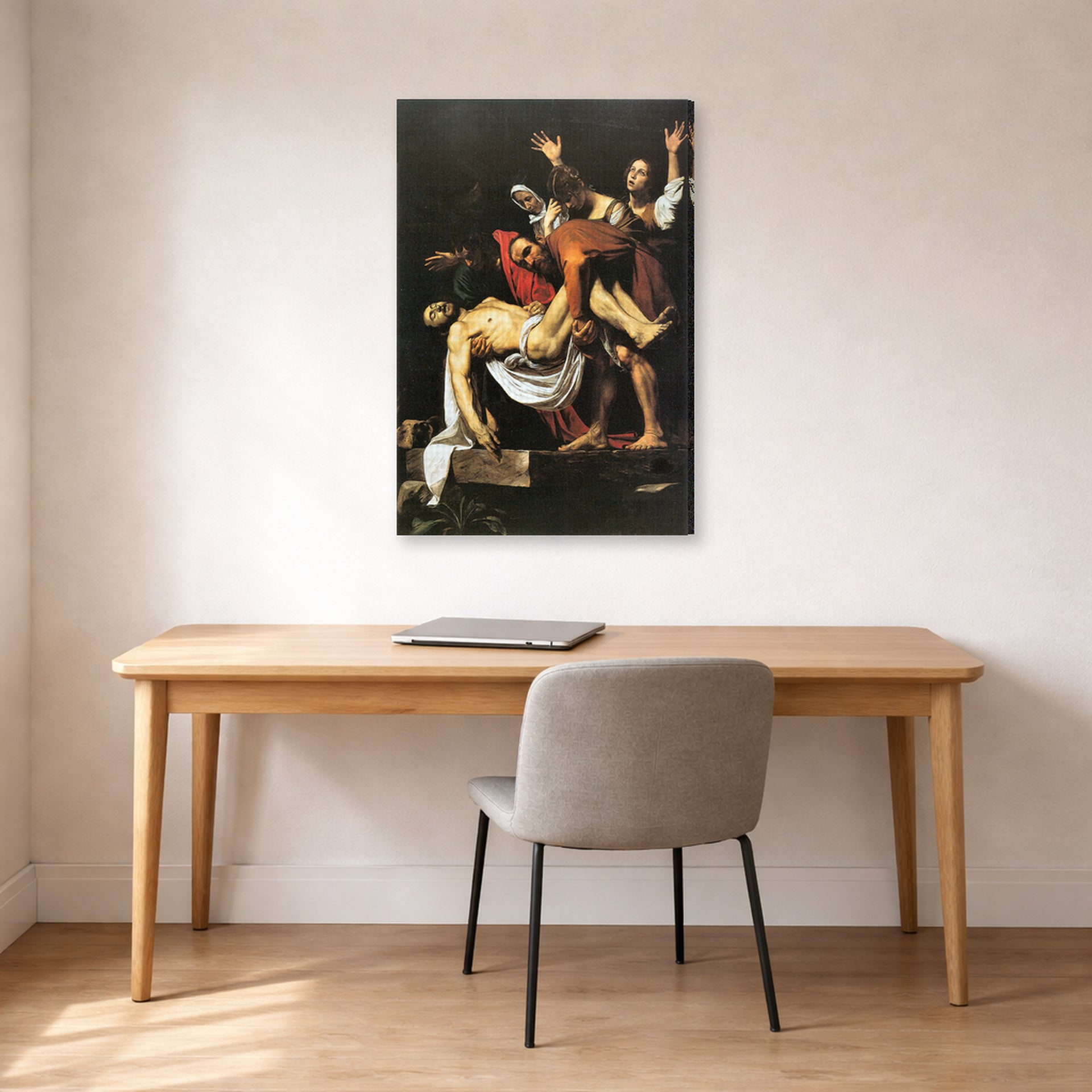 Gallery-wrapped canvas print of Caravaggio's 'The Entombment of Christ' displayed on a wall in an office