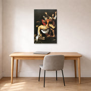 Unframed poster print of Caravaggio's 'The Entombment of Christ' displayed on a wall in an office