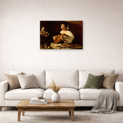 Unframed poster print of Caravaggio's 'The Lute Player' displayed on a wall in a living room