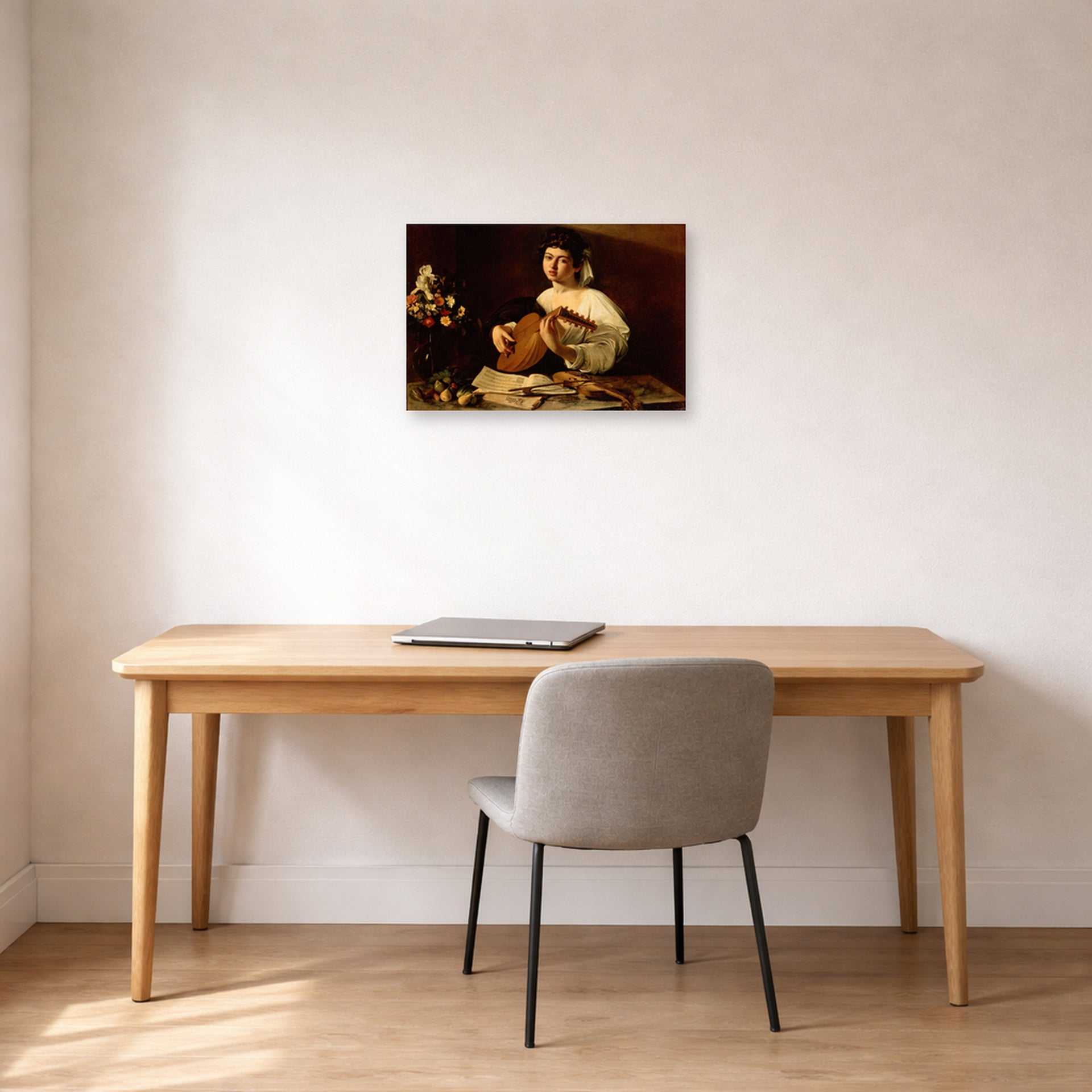 Unframed poster print of Caravaggio's 'The Lute Player' displayed on a wall in an office