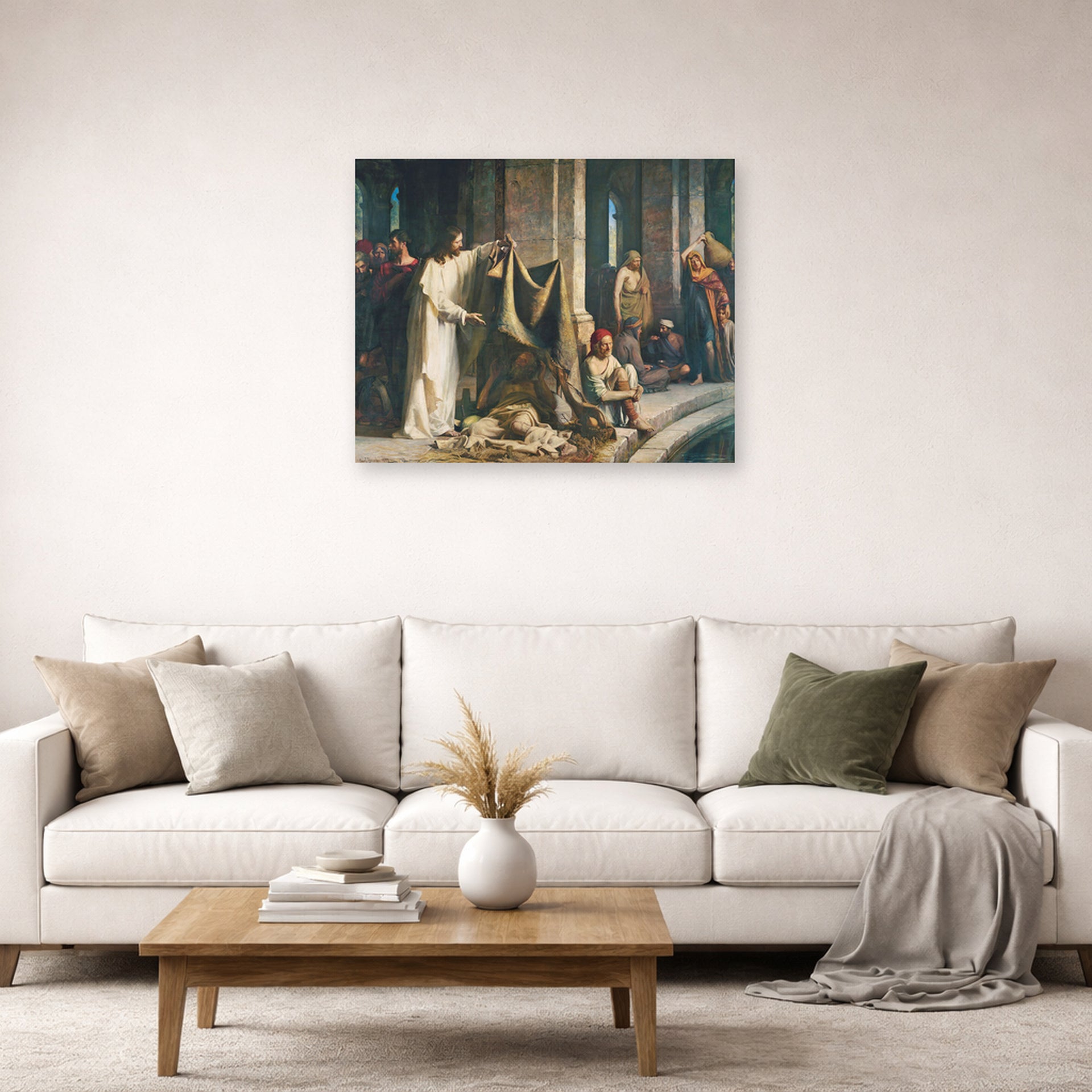 Unframed poster print of Carl Bloch's Christ Healing the Sick at Bethesda displayed on a wall in a living room