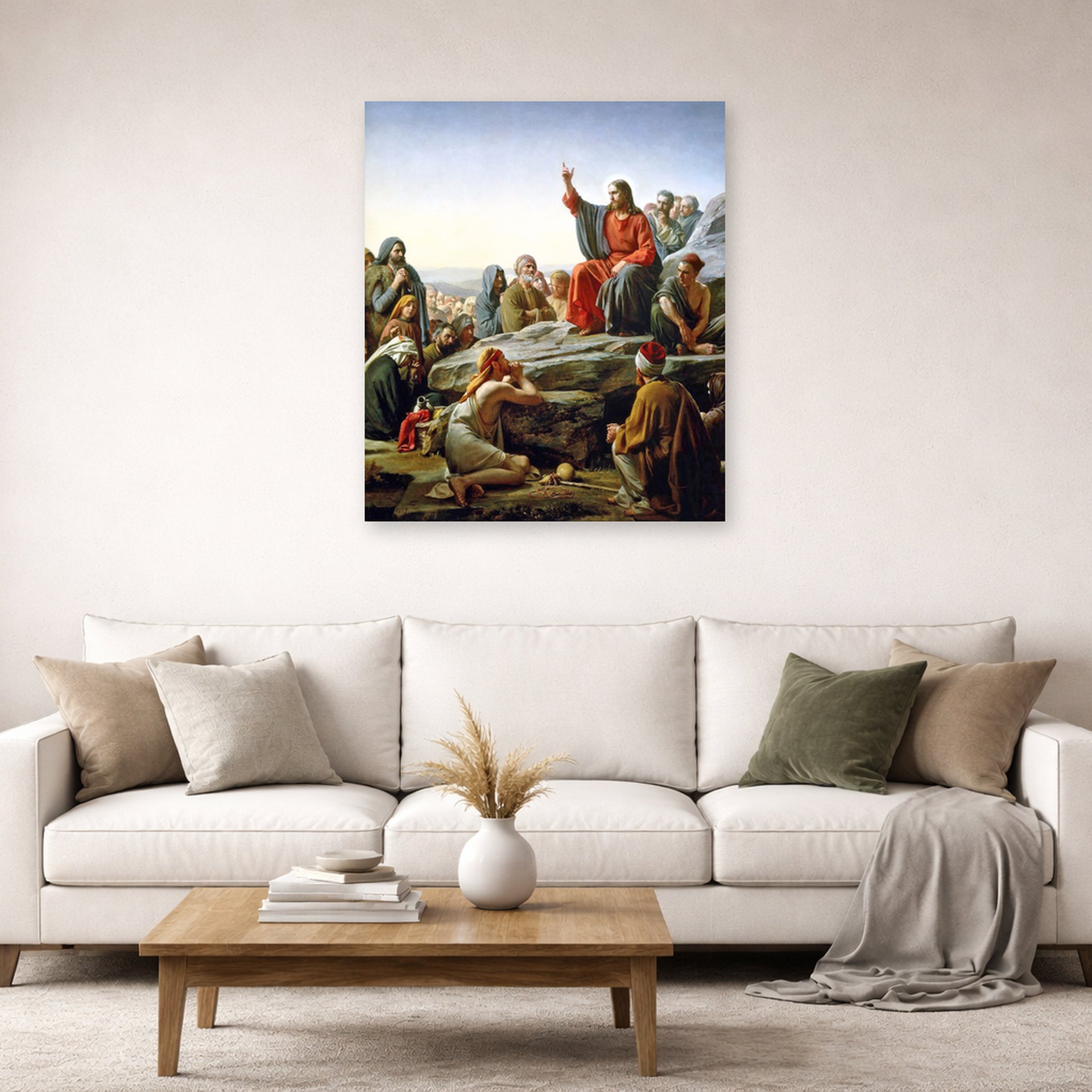 Unframed poster print of Carl Bloch's Sermon on the Mount displayed on a wall in a living room