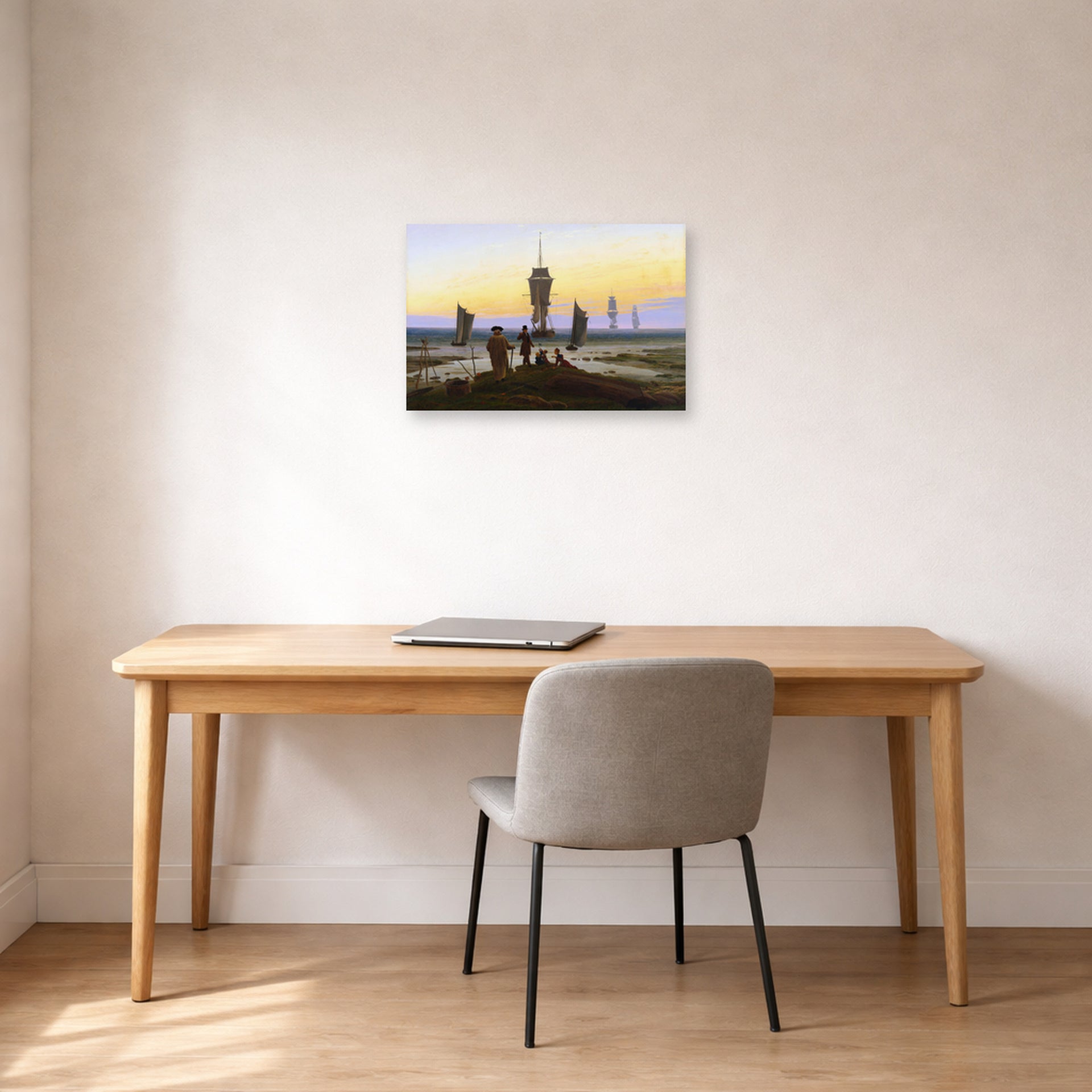 Unframed poster print of Caspar David Friedrich's The Stages of Life displayed on a wall in a office