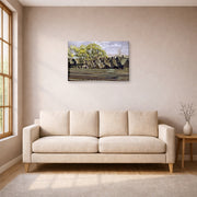 Gallery-wrapped canvas print of Charles Burchfield's Railroad In Spring displayed on a wall in a living room