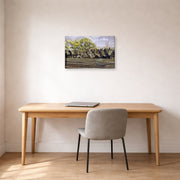 Gallery-wrapped canvas print of Charles Burchfield's Railroad In Spring displayed on a wall in a office