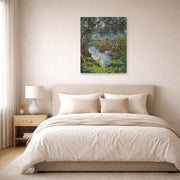 Unframed poster print of Claude Monet's 'Alice Hoschede in the Garden' displayed on a wall in a bedroom