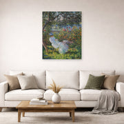Unframed poster print of Claude Monet's 'Alice Hoschede in the Garden' displayed on a wall in a living room