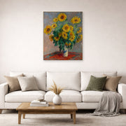 Unframed poster print of Claude Monet's 'Bouquet of Sunflowers' displayed on a wall in a living room
