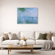 Gallery-wrapped canvas print of Claude Monet's 'Charing Cross Bridge' displayed on a wall in a living room