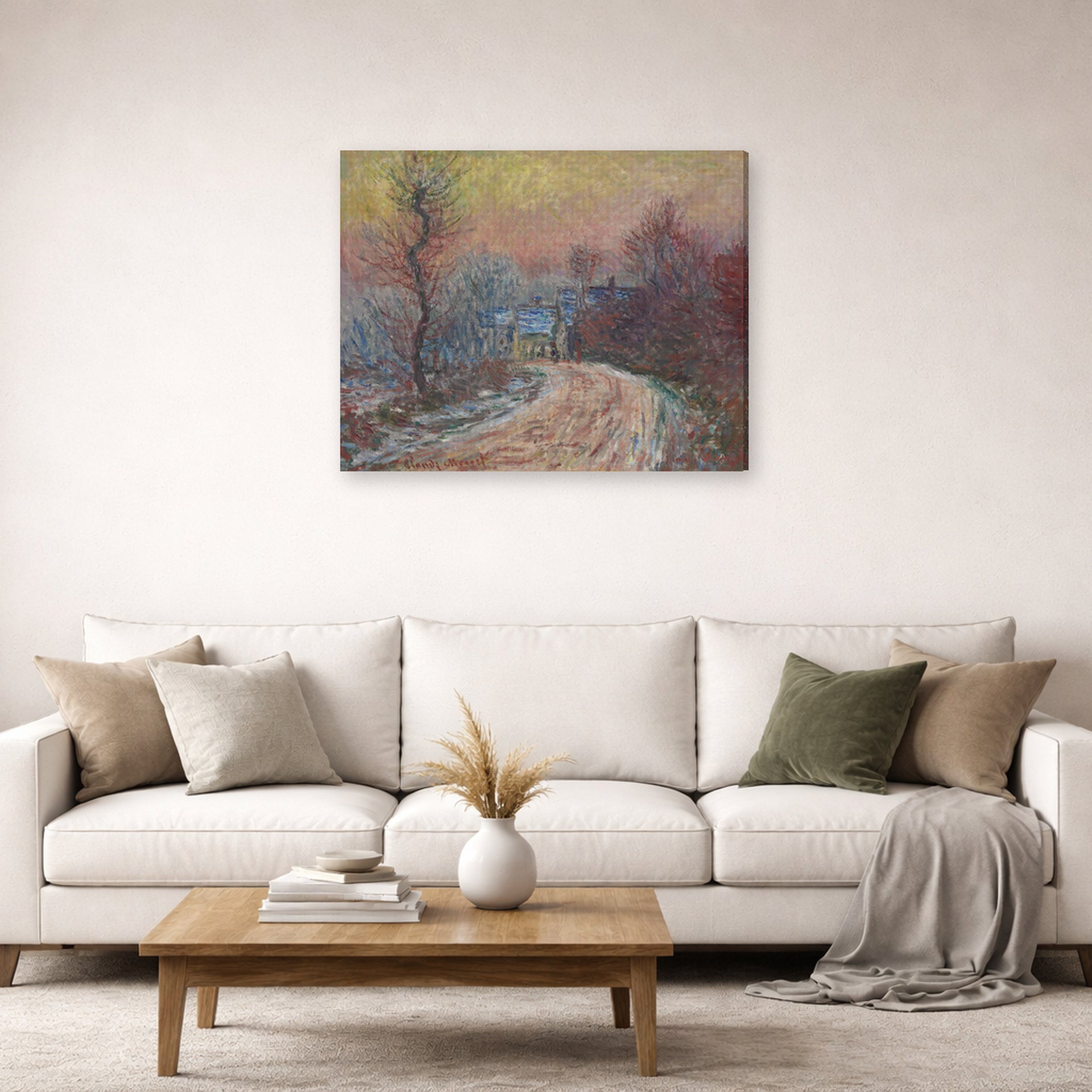 Gallery-wrapped canvas print of Claude Monet's 'Entrance to Giverny in Winter, Setting Sun' displayed on a wall in a living room