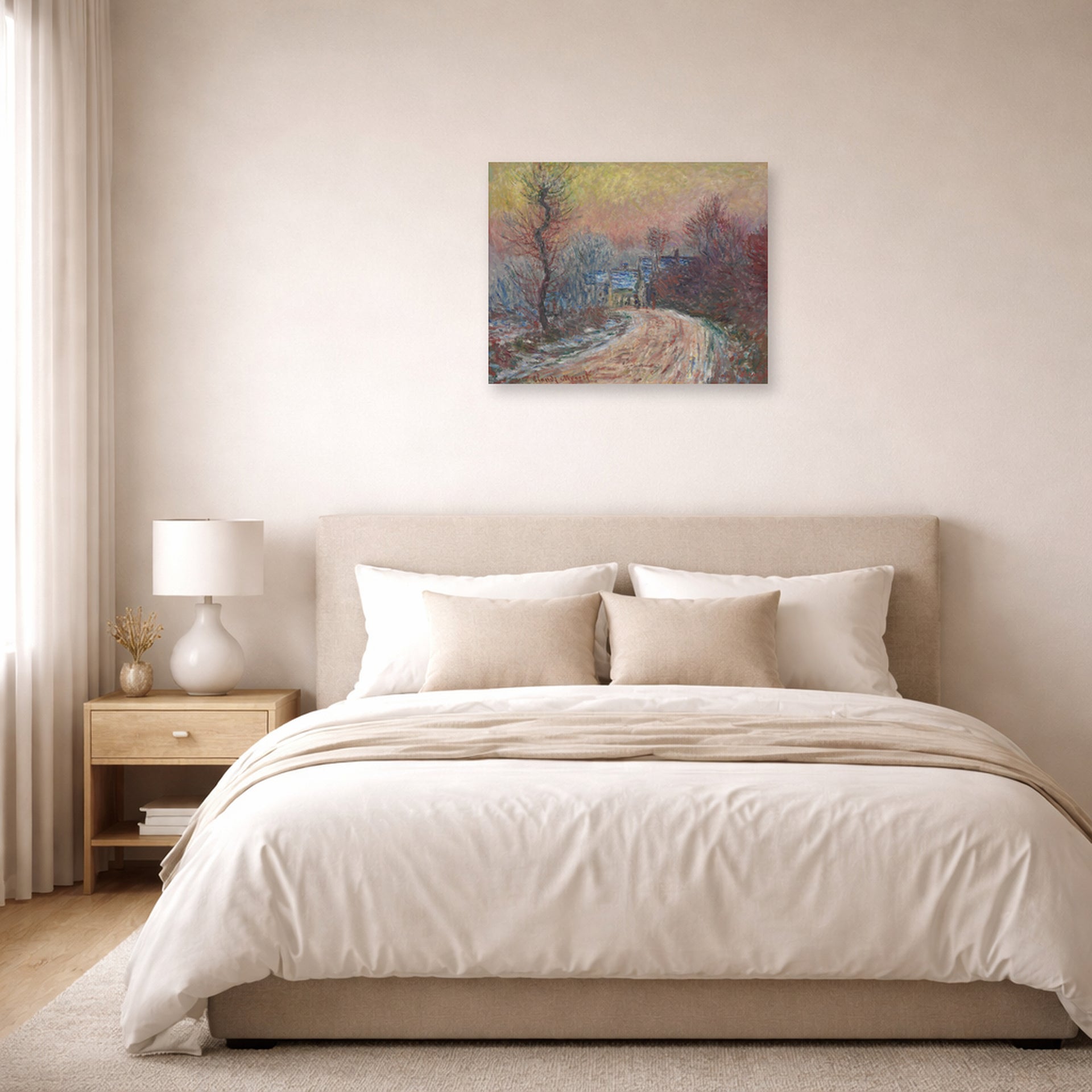 Unframed poster print of Claude Monet's 'Entrance to Giverny in Winter, Setting Sun' displayed on a wall in a bedroom
