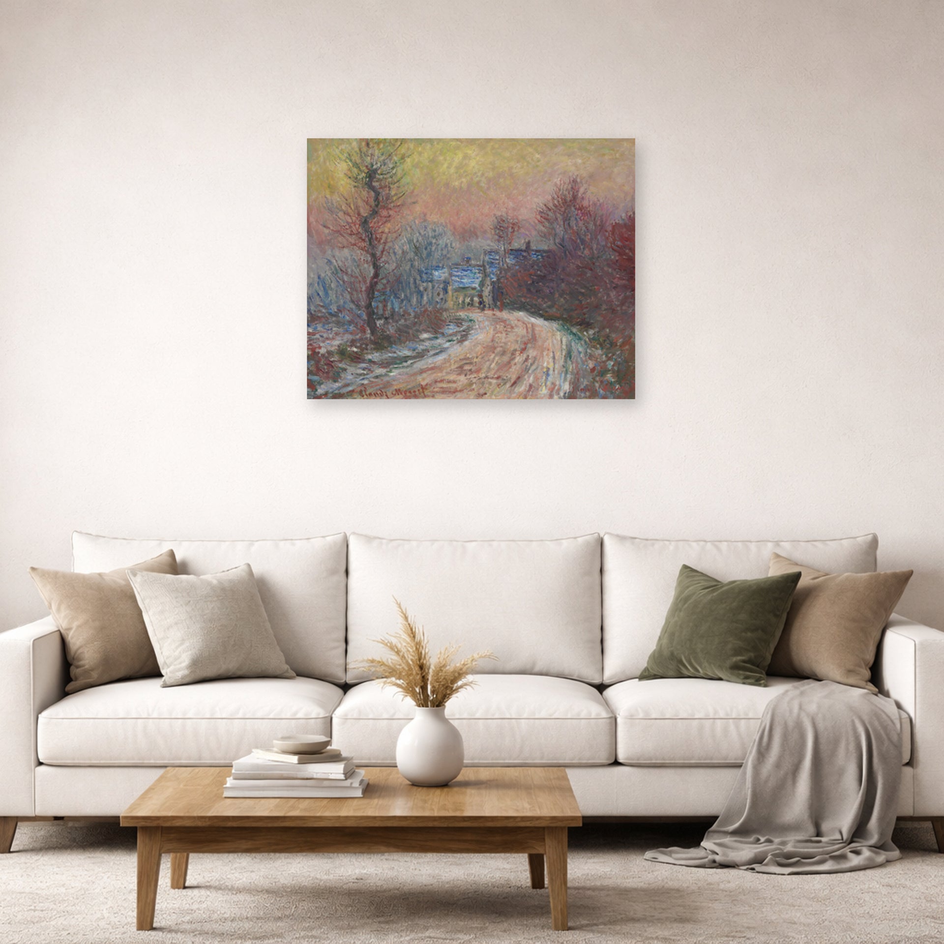 Unframed poster print of Claude Monet's 'Entrance to Giverny in Winter, Setting Sun' displayed on a wall in a living room