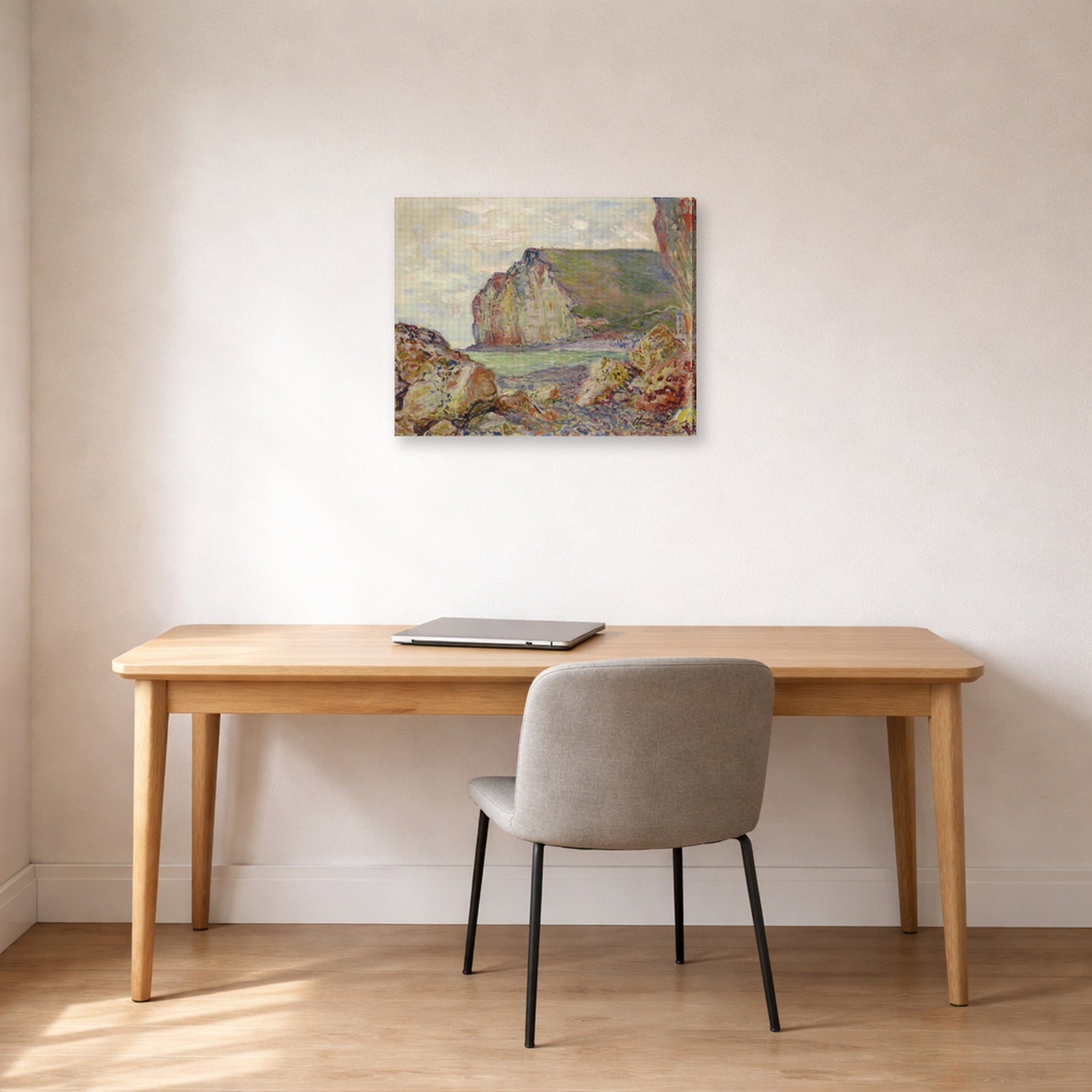 Gallery-wrapped canvas print of Claude Monet's 'Falaises Des Petites Dalles' displayed on a wall in a office