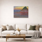 Unframed poster print of Claude Monet's 'Meule' displayed on a wall in a living room