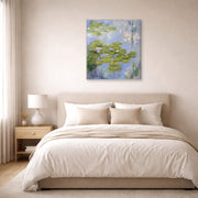 Gallery-wrapped canvas print of Claude Monet's 'Nympheas Water-lilies' displayed on a wall in a bedroom