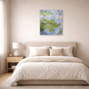 Unframed poster print of Claude Monet's 'Nympheas Water-lilies' displayed on a wall in a bedroom