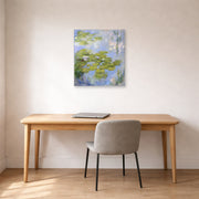 Unframed poster print of Claude Monet's 'Nympheas Water-lilies' displayed on a wall in a office