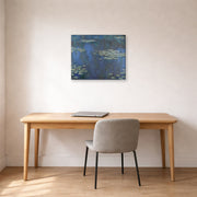 Gallery-wrapped canvas print of Claude Monet's 'Nympheas' displayed on a wall in a office