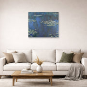 Unframed poster print of Claude Monet's 'Nympheas' displayed on a wall in a living room