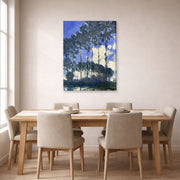 Gallery-wrapped canvas print of Claude Monet's 'Poplars on the Epte' displayed on a wall in a dining room