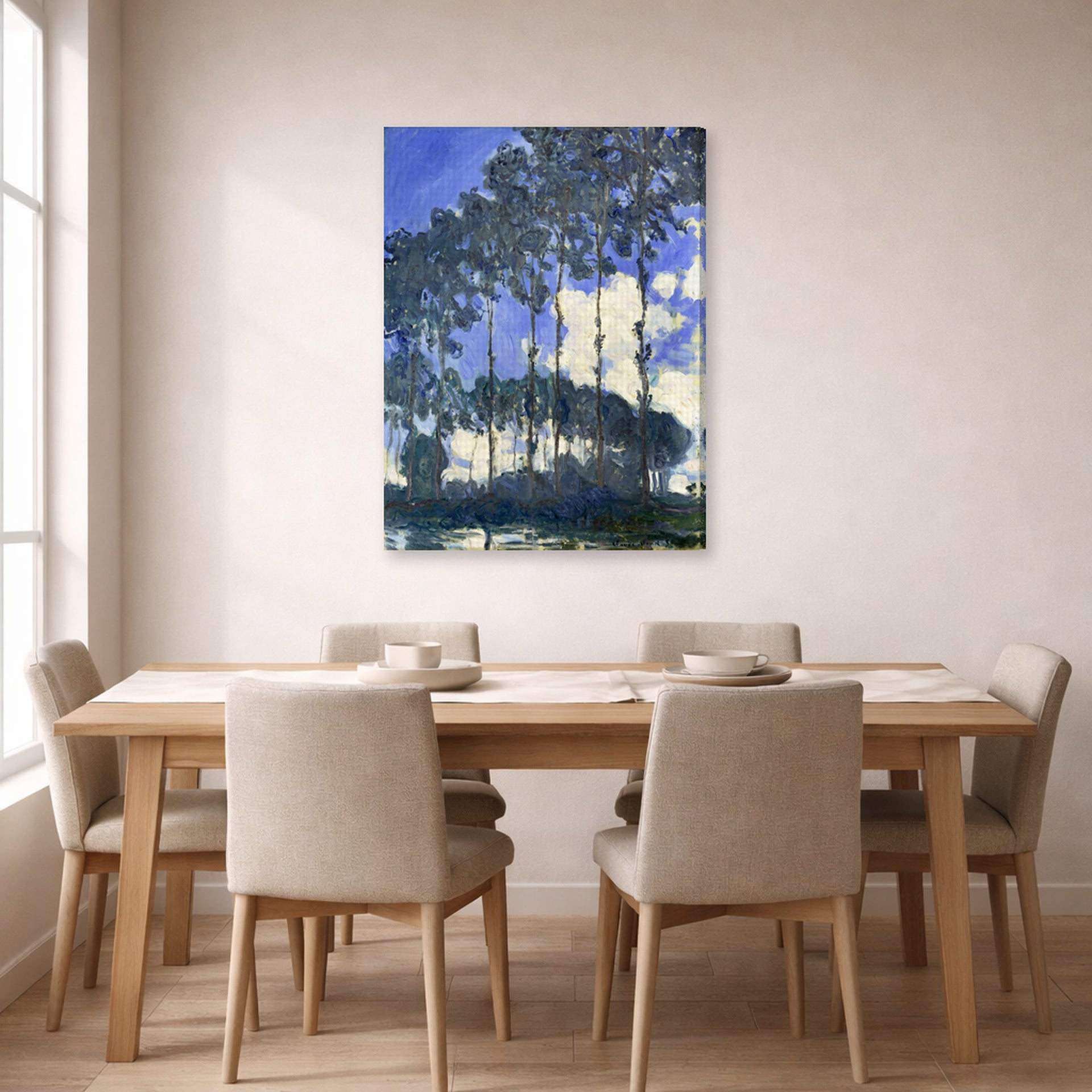 Gallery-wrapped canvas print of Claude Monet's 'Poplars on the Epte' displayed on a wall in a dining room