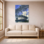 Gallery-wrapped canvas print of Claude Monet's 'Poplars on the Epte' displayed on a wall in a living room