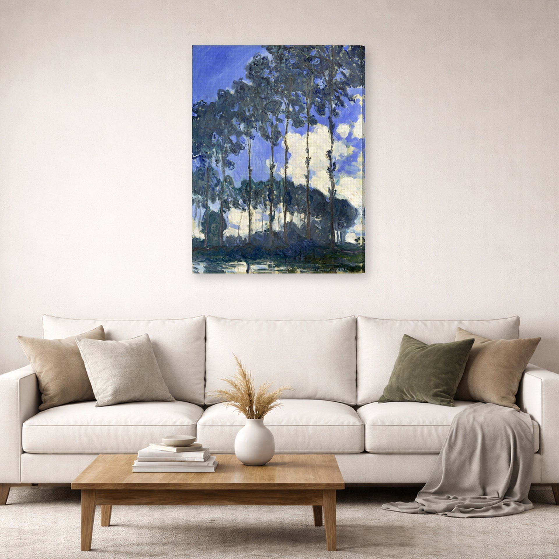 Gallery-wrapped canvas print of Claude Monet's 'Poplars on the Epte' displayed on a wall in a living room
