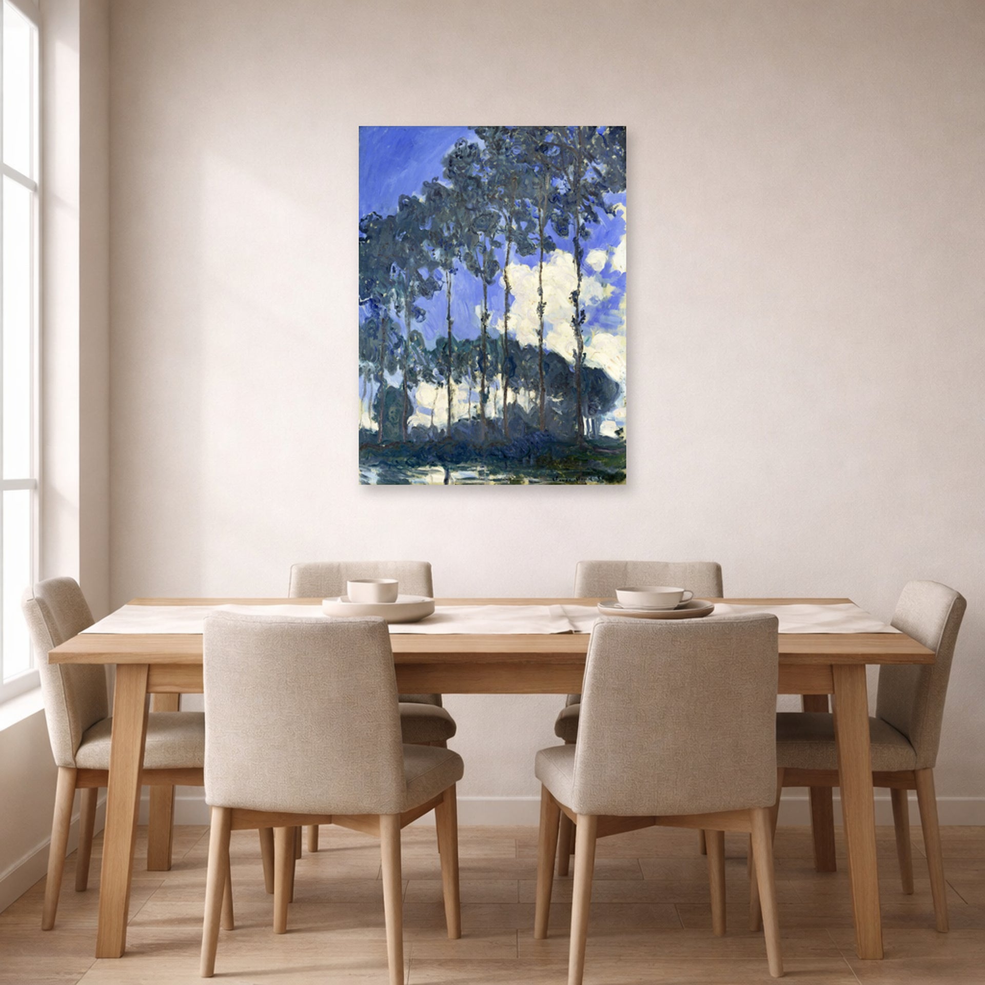 Unframed poster print of Claude Monet's 'Poplars on the Epte' displayed on a wall in a dining room