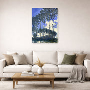 Unframed poster print of Claude Monet's 'Poplars on the Epte' displayed on a wall in a living room