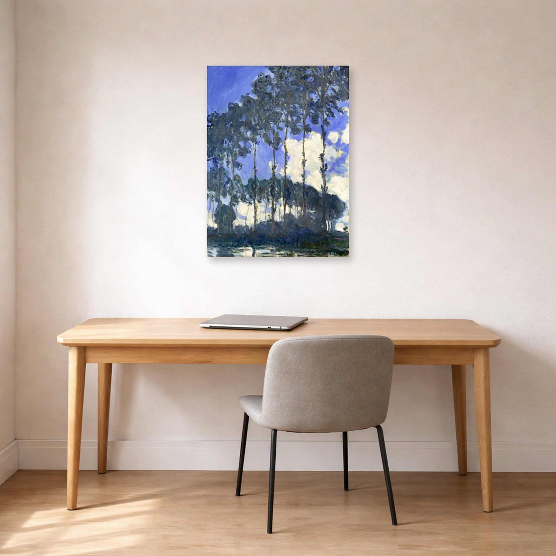 Unframed poster print of Claude Monet's 'Poplars on the Epte' displayed on a wall in a office