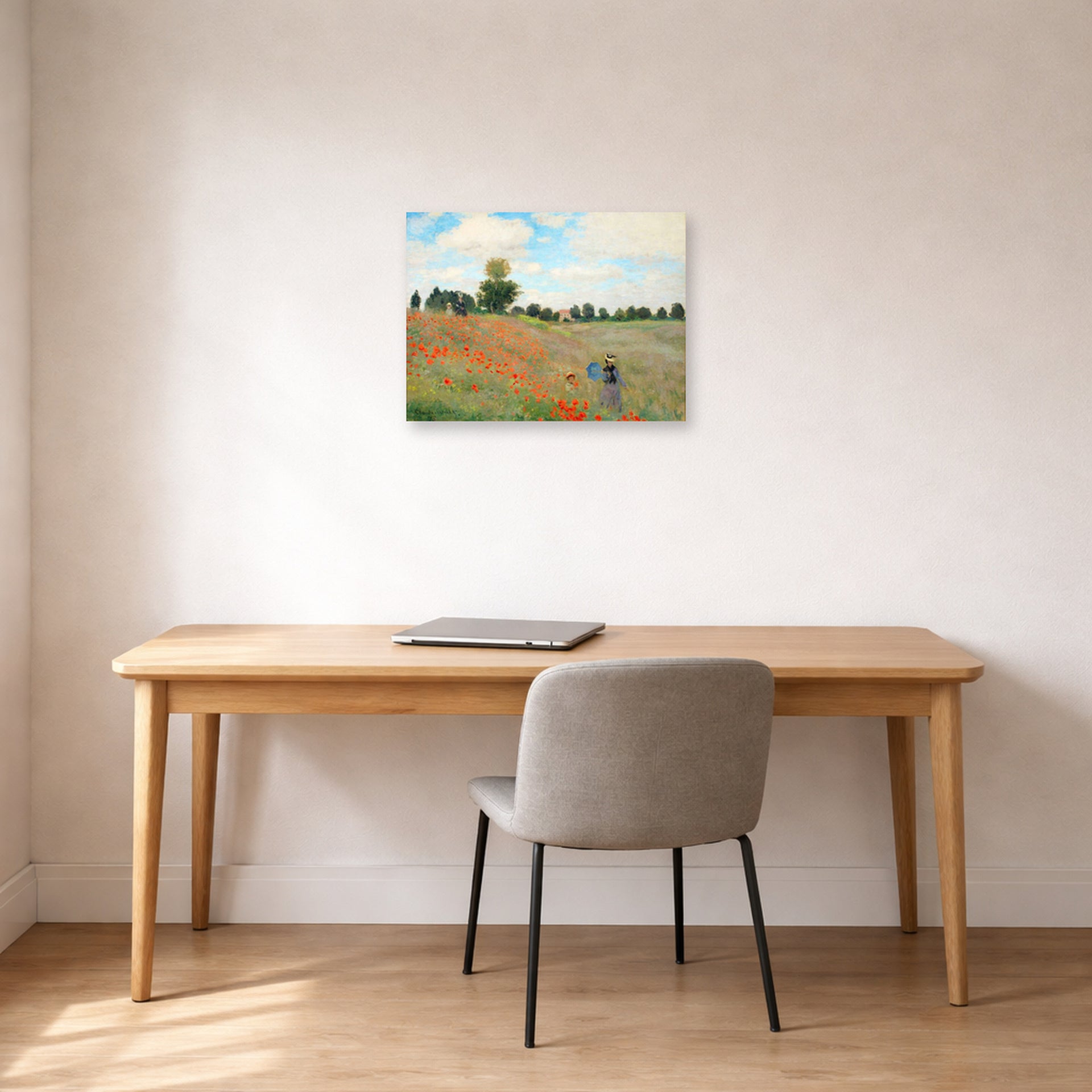 Unframed poster print of Claude Monet's 'Poppies near Argenteuil' displayed on a wall in a office