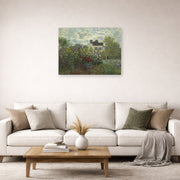 Unframed poster print of Claude Monet's 'The Artist's Garden in Argenteuil (a Corner of the Garden with Dahlias)' displayed on a wall in a living room