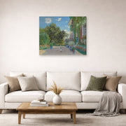 Gallery-wrapped canvas print of Claude Monet's 'The Artist's House at Argenteuil' displayed on a wall in a living room