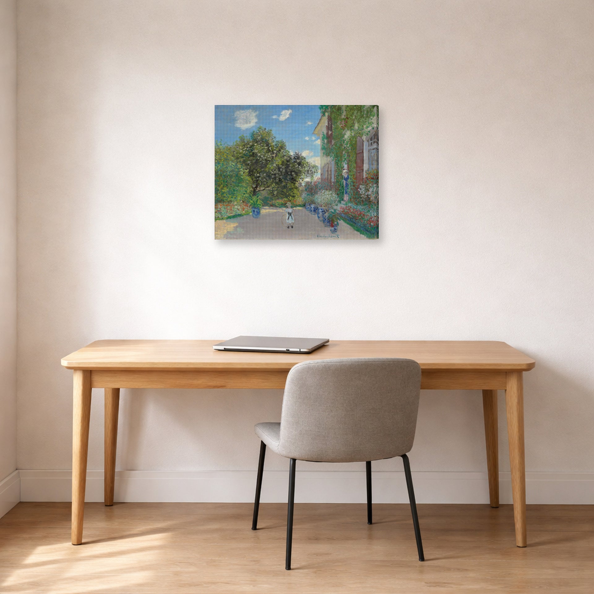 Gallery-wrapped canvas print of Claude Monet's 'The Artist's House at Argenteuil' displayed on a wall in a office