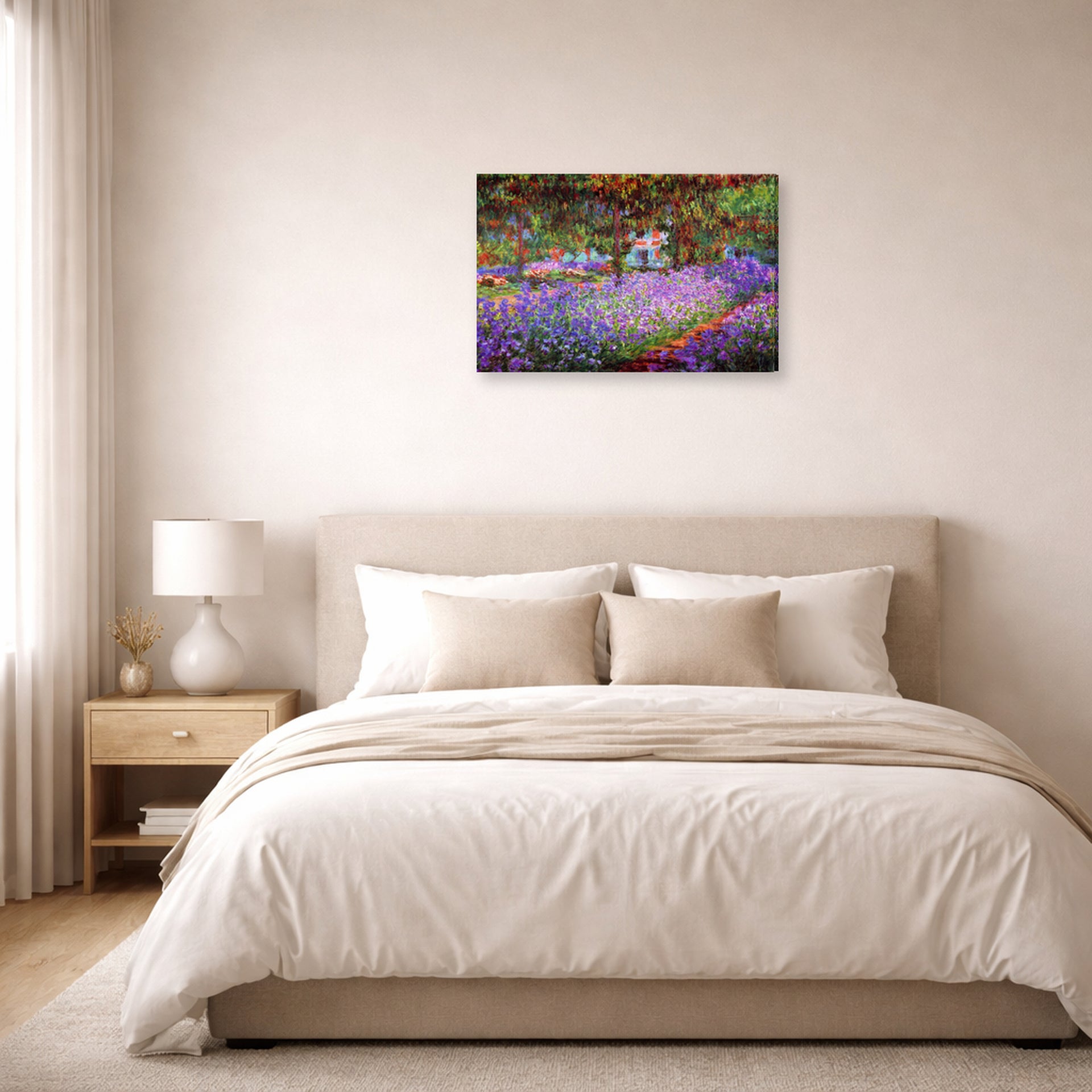 Gallery-wrapped canvas print of Claude Monet's 'The Artists Garden at Giverny' displayed on a wall in a bedroom