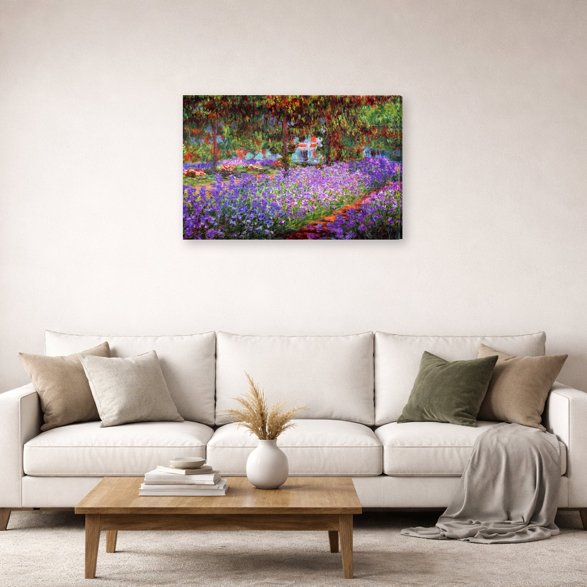 Gallery-wrapped canvas print of Claude Monet's 'The Artists Garden at Giverny' displayed on a wall in a living room