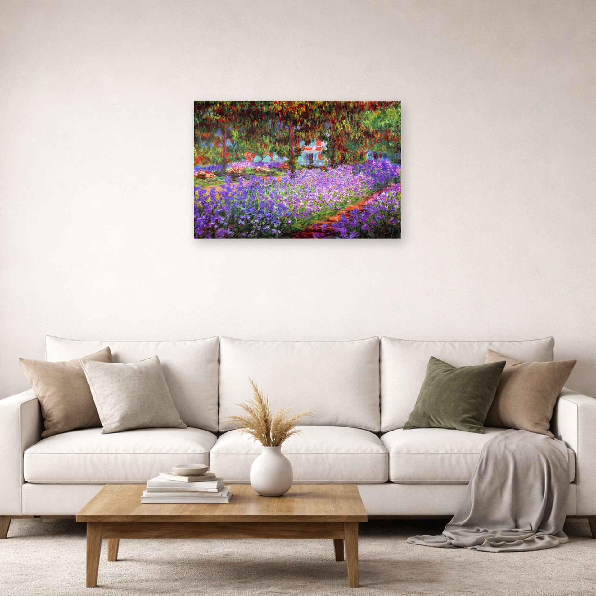 Unframed poster print of Claude Monet's 'The Artists Garden at Giverny' displayed on a wall in a living room