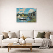 Gallery-wrapped canvas print of Claude Monet's 'The Bridge at Argenteuil' displayed on a wall in a living room